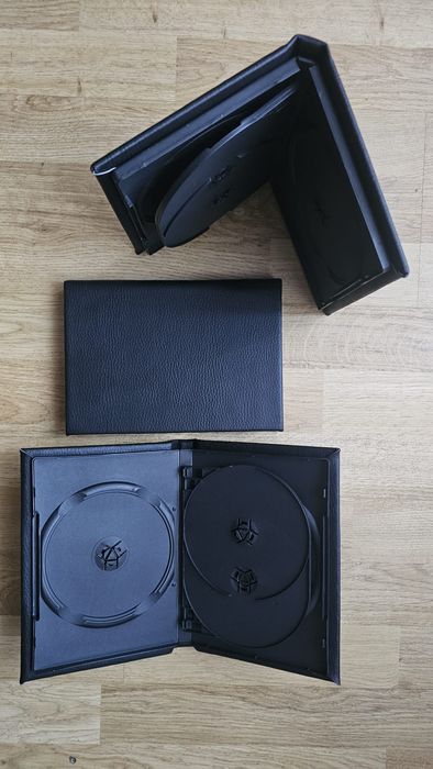 Carcase DVD uri, plastic si piele ecologica