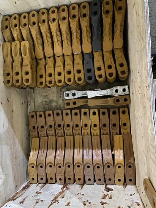 Зубья,адаптеры,фиксаторы,коронки