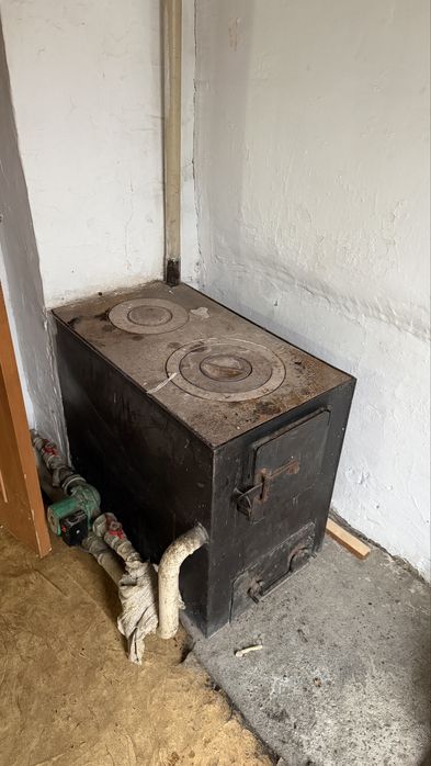 Металическая печка отопления