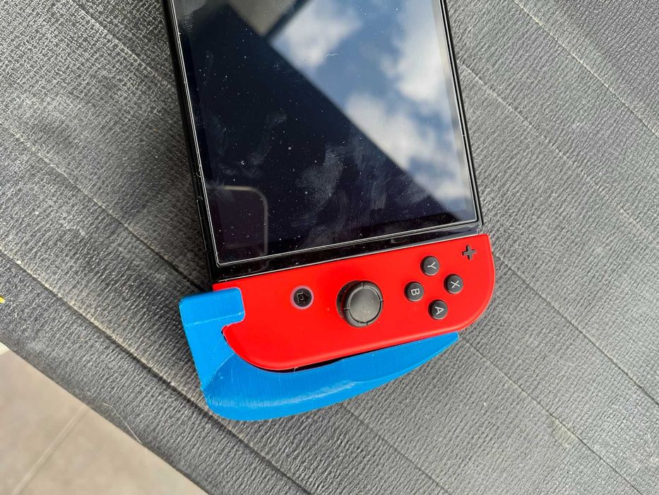 Consola Nintendo Switch + jocuri Pokémon + dock + accesorii (grip 3D + husă)