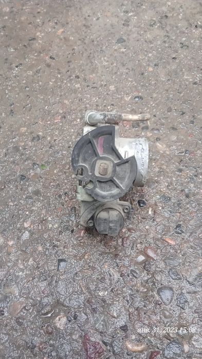 Заслонка Nexia 1.5 Donc