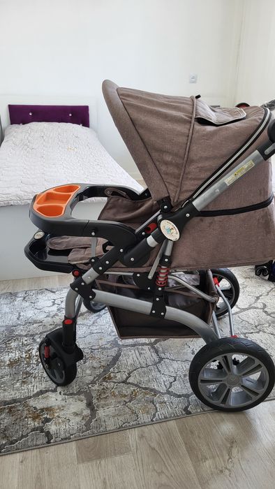 Детская коляска..