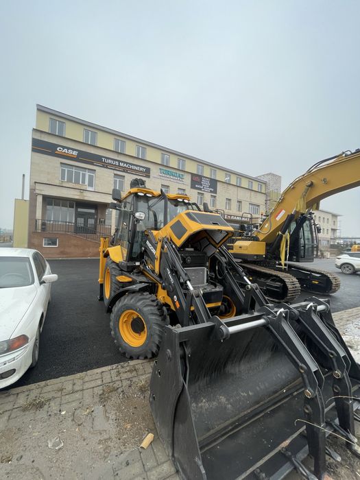 Экскаватор погрузчик Rigor