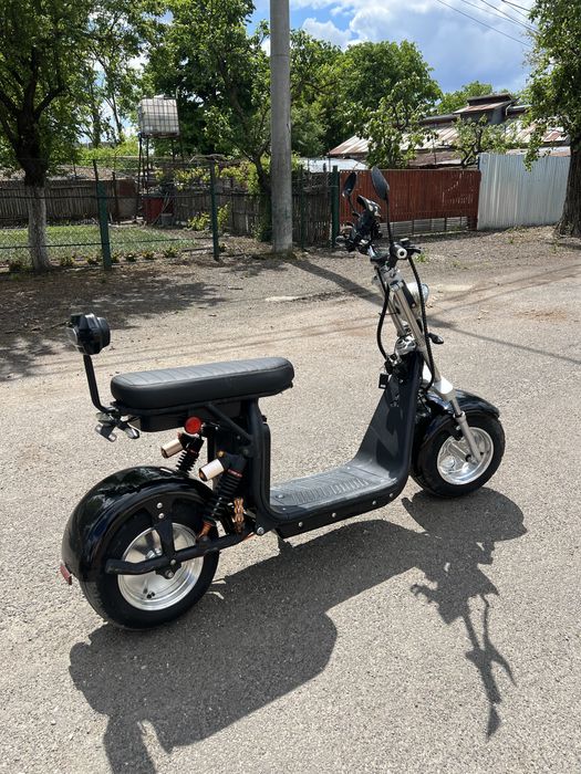 Moped electric, 60km/h cu buton de limitare