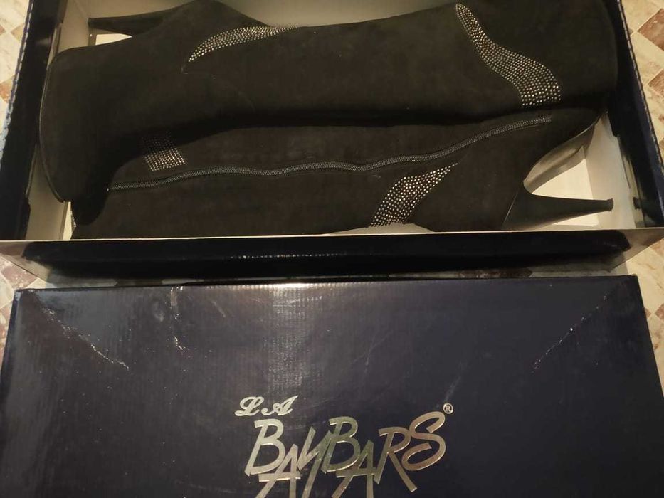 Продам зимние Сапоги.