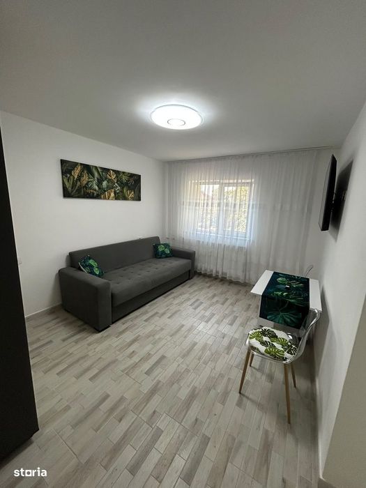Închiriez garsonieră, modernă, zonă liniștită.