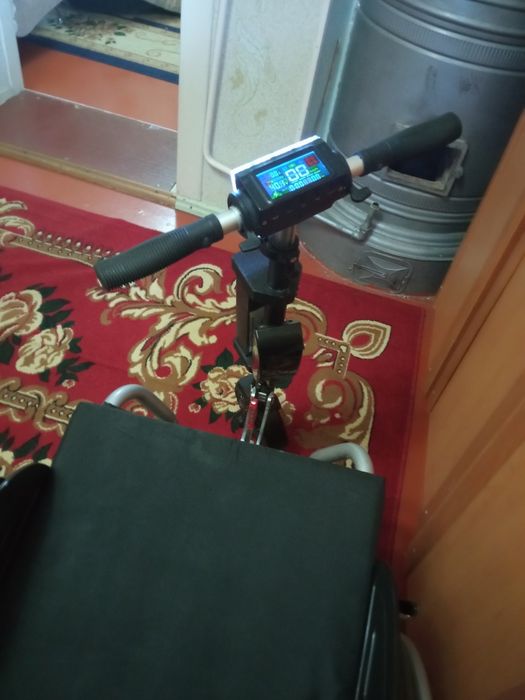 Продам электронную коляску