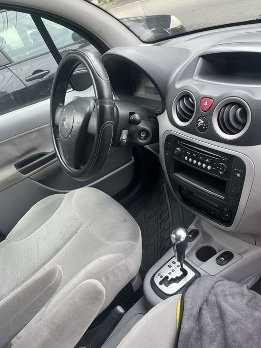 Masina este 1.6 benzina este automata ful