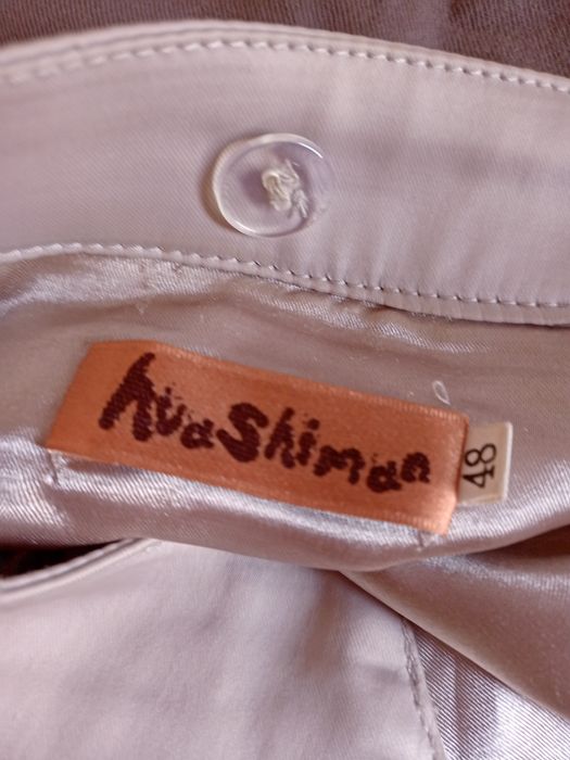 Продам весенний плащ перламутрового серебристого цвета