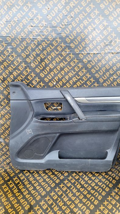 Обшивка двери Паджеро 3