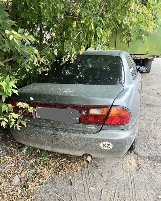 Мазда 323 в аварийном состоянии