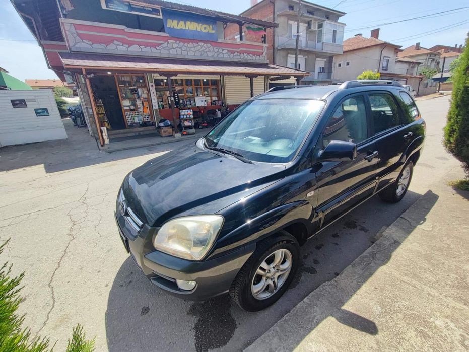 Кия спортидж бензин