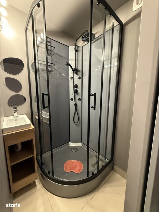 Apartament cu garaj, grădină, aer conditionat și centrală proprie