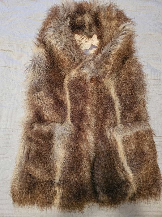 Комплект от пухкав елек и гети