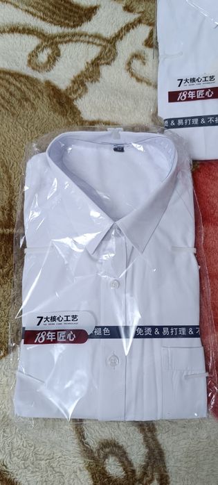 Рубашки белые новые