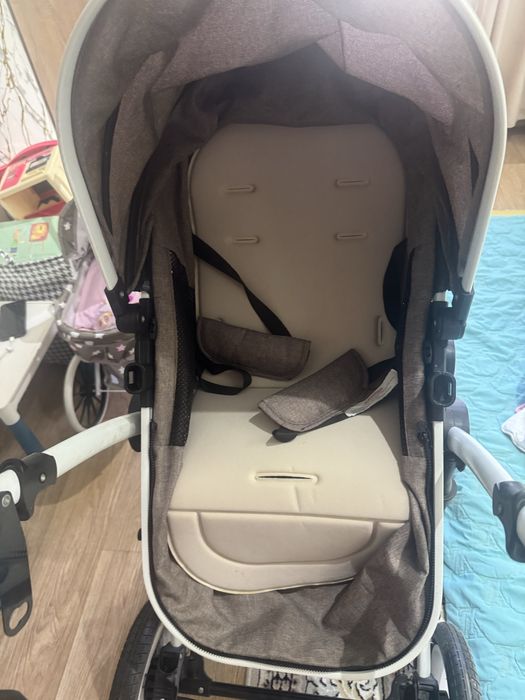 Детская коляска коричневая