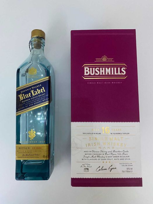Празна бутилка синьо Джони (Bue Label) и празна бутилка Бушмилс 16 г.