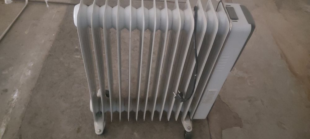 Масляный обогреватель 2шт.