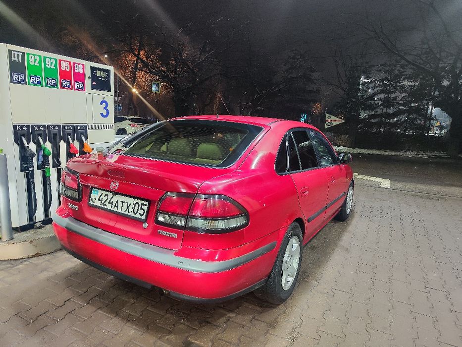 Мазда 626 птичка