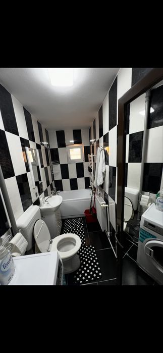 Vand garsoniera complet mobilata si utilata