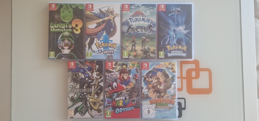 Nintendo Switch V1 (unpatched)с кутия - пълен комплект +  калъф за пренасяне + 7 игри