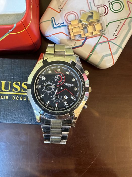 Часовник FOSSIL и Oruss