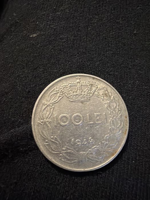 Moneda din 1944 de 100 de lei vecie.