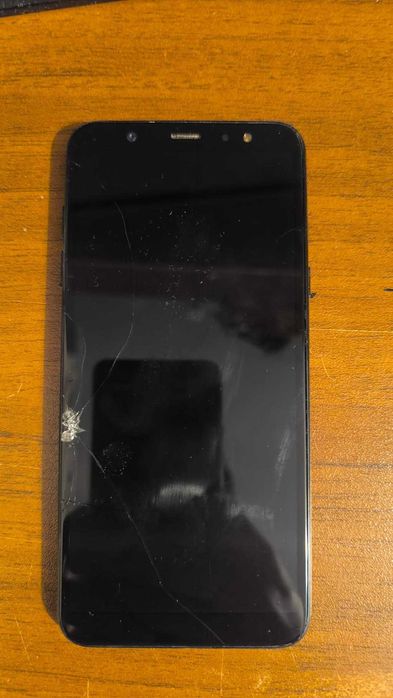 Телефони за части