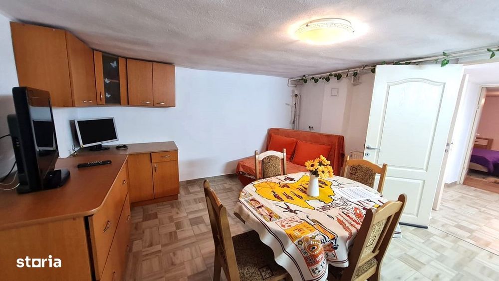 Apartament 2 camere la demisolul unei case,  zona Sub Arini