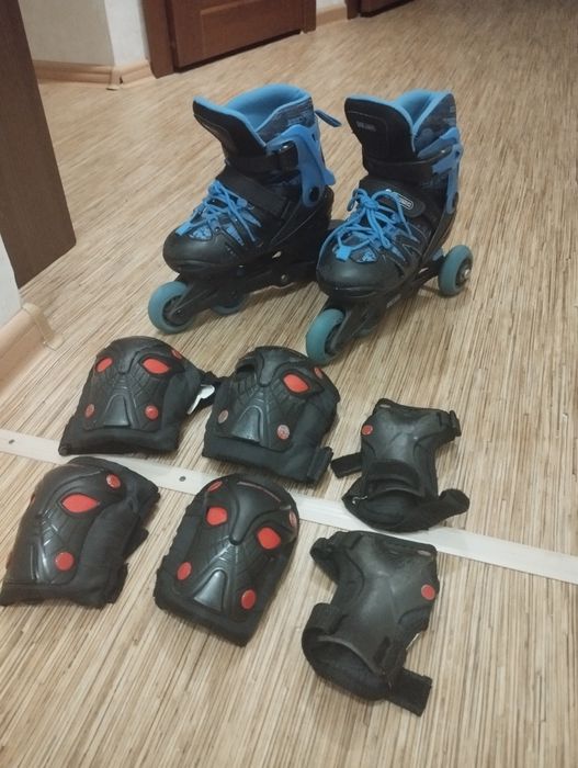 Роликовые коньки