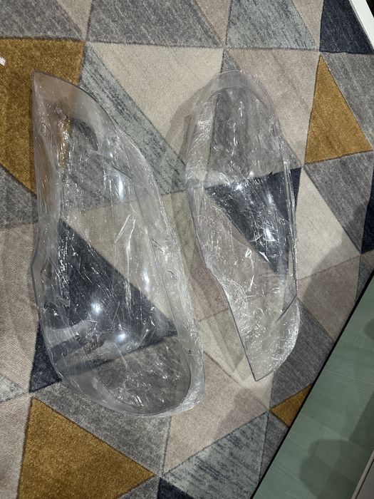 Стекла фар bmw e70