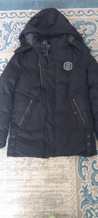 Продам  зимний пуховик