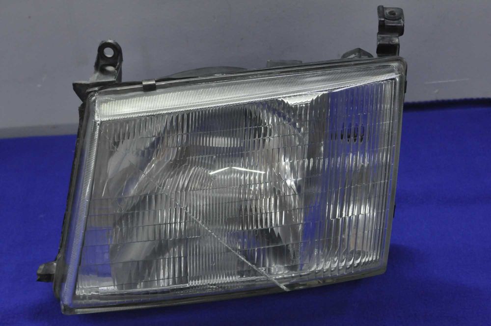 фара Toyota Land Cruiser 100 Левая