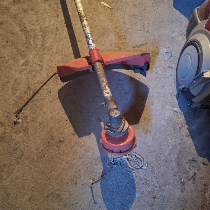 Триммер косить траву