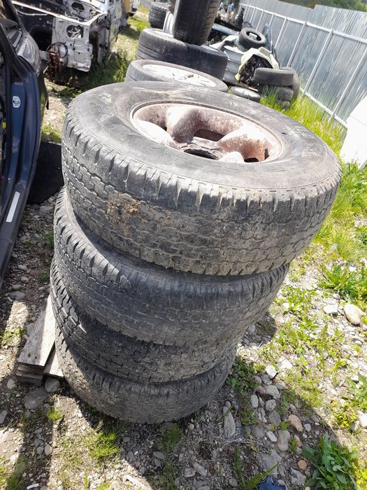 Jante hyundai galloper 15 cu tot cu cauciucuri  pajero nissan