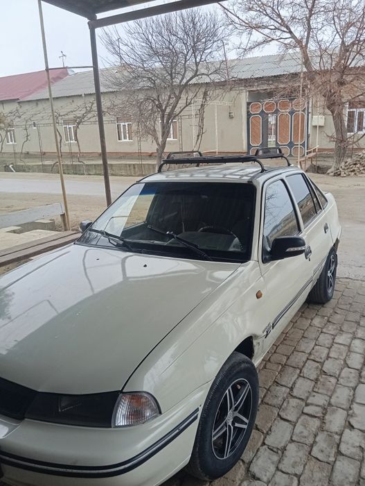 Мошинани холати яхши кузипида иши бор озгина бензин газда йуради