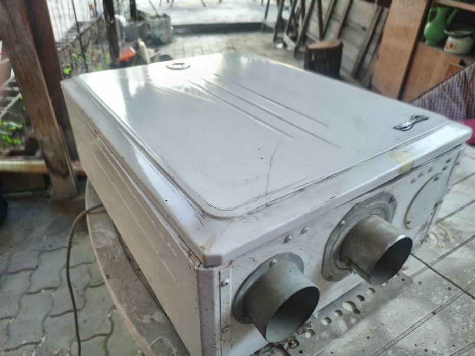 Продам газовую на стеную печь