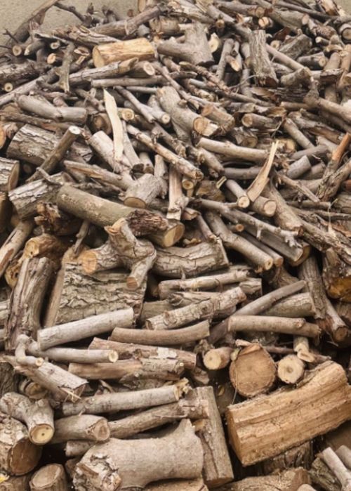 Дрова колотые в мешках