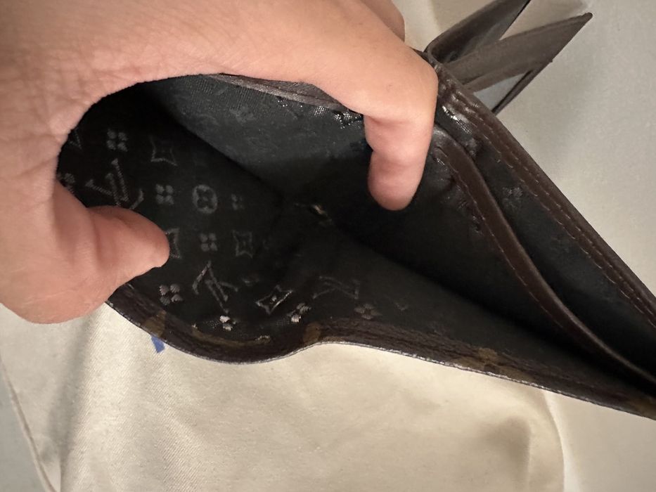 Louise Vuitton leather wallet