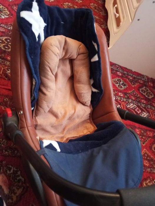 Автокресло кожали