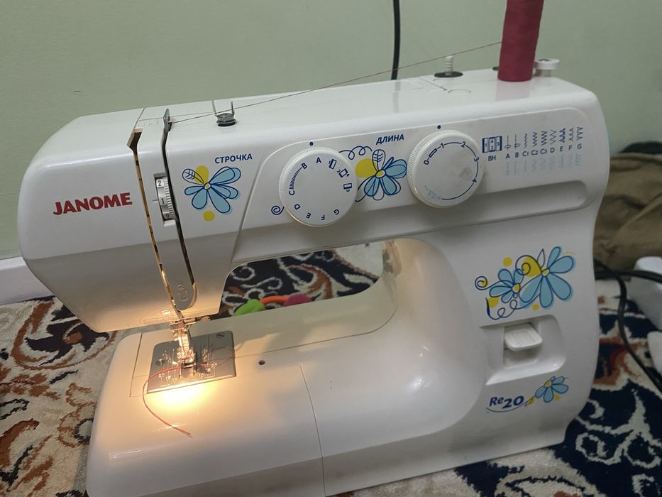 Швейная машина Janome RE-20 белый