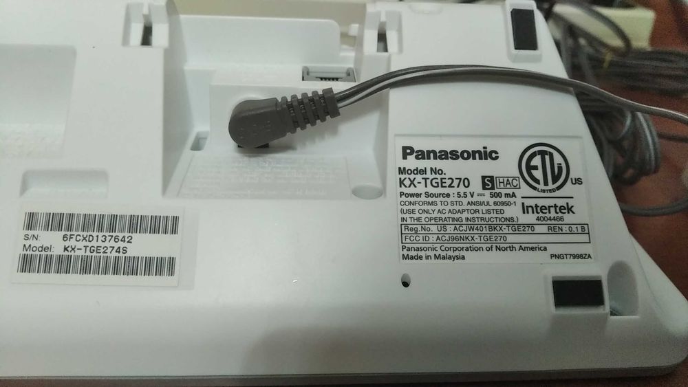 Продам радиотелефон PANASONIС четыре трубки на один телефонный номер.