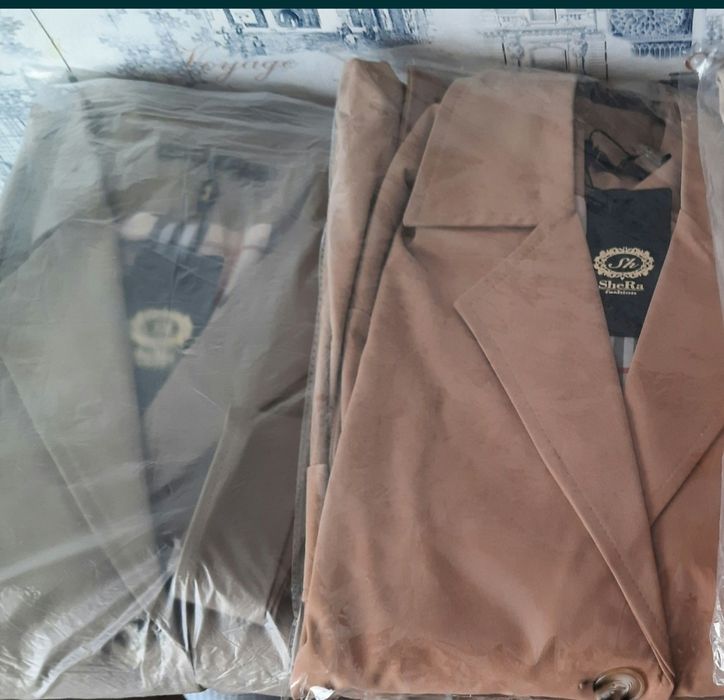 Плащ   новый       18000тенге