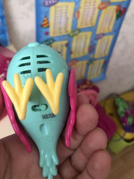 Продам игрушку птичка в клетке