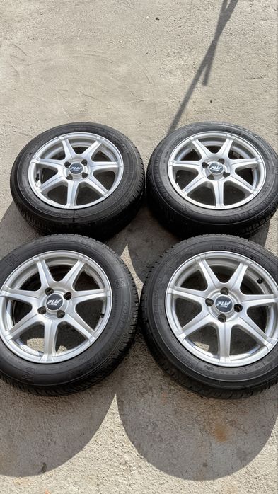 Джанти с гуми за хонда опел фолксваген 4х100 15”