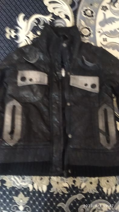 Куртки на девочку