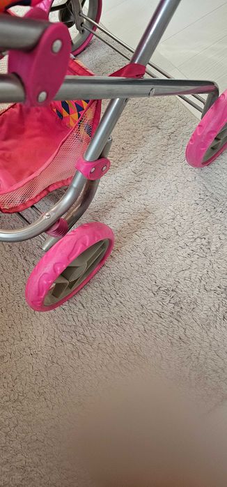 Игрушечная детская коляска