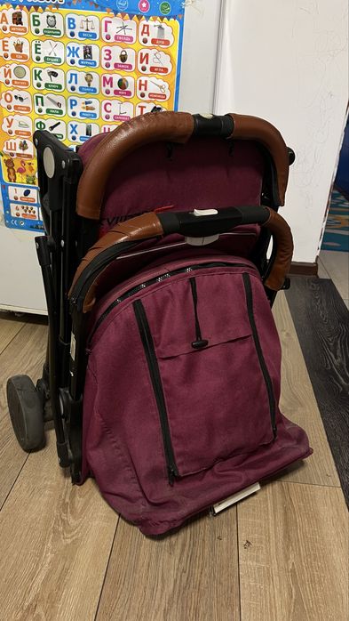 Детская розовая коляска