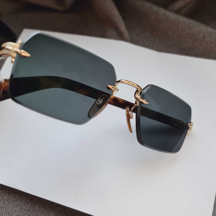 Солнцезащитные очки DB.