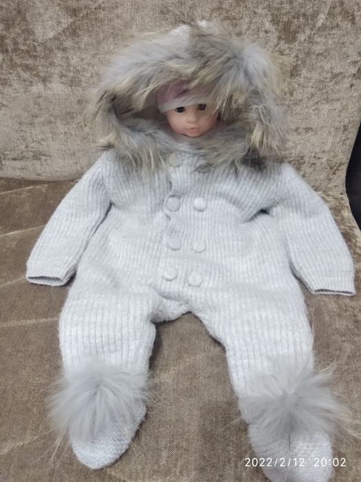 Детский вязаный комбинезон